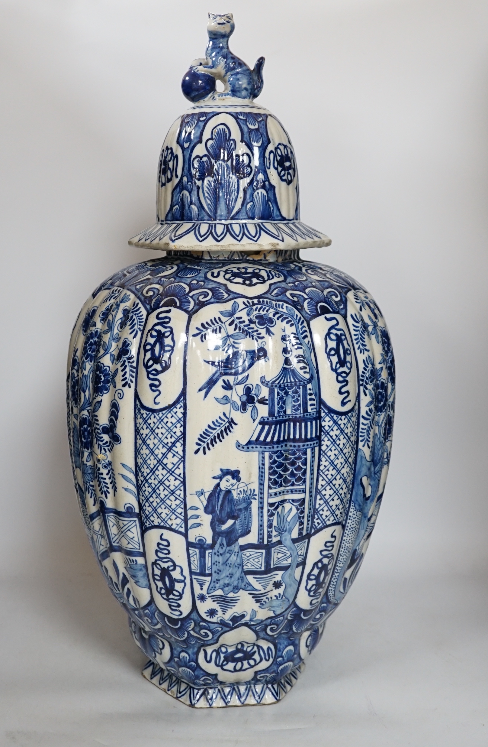 A Delft blue and white jar and cover, in the Chinese style possibly 19th century, marked BP to base, 59cm